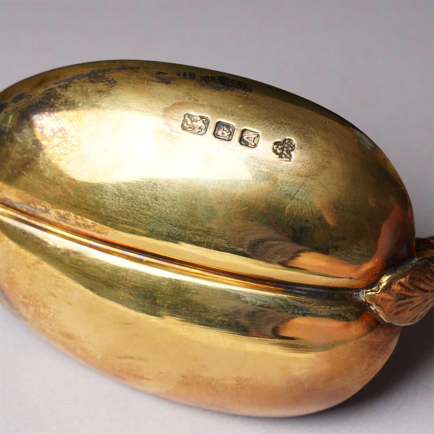 George III silver pap boat with gilded interior London 1799 and a silver gilt copy of the Coronation spoon, cased L25cm London 1936 Maker Wakely & Wheeler