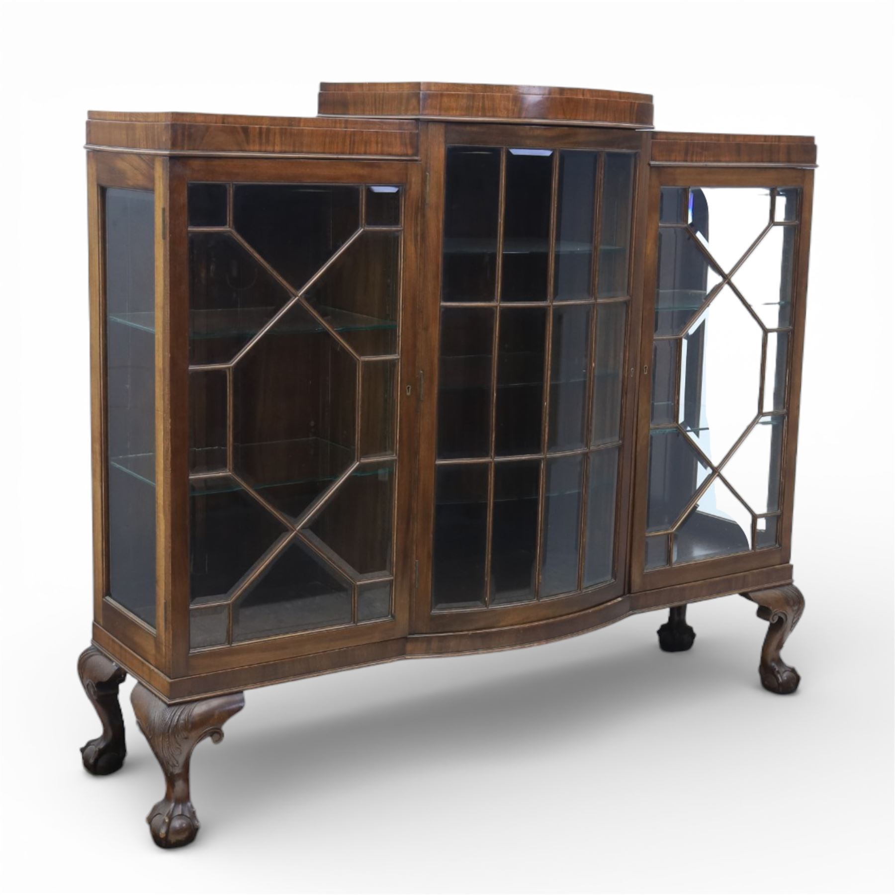  20th century large mahogany breakfront bookcase, with astragal glazed doors revealing an adjustable glass shelved interior, raised on ball and claw feet 