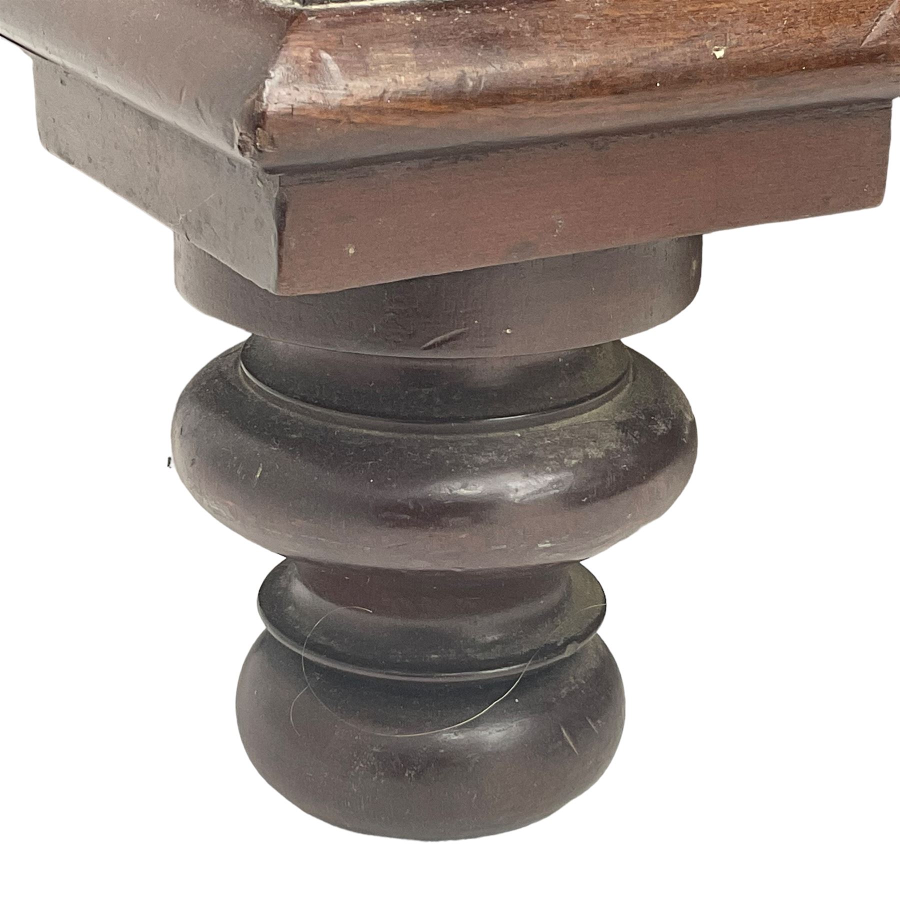 Early 19th century figured mahogany bureau bookcase, projecting splay moulded cornice over three adjustable shelves enclosed by two glazed doors, fall front revealing pigeonholes, cupboard and drawers, pull-out strays with scroll carved terminals, double cupboard with two panelled doors, on turned feet 