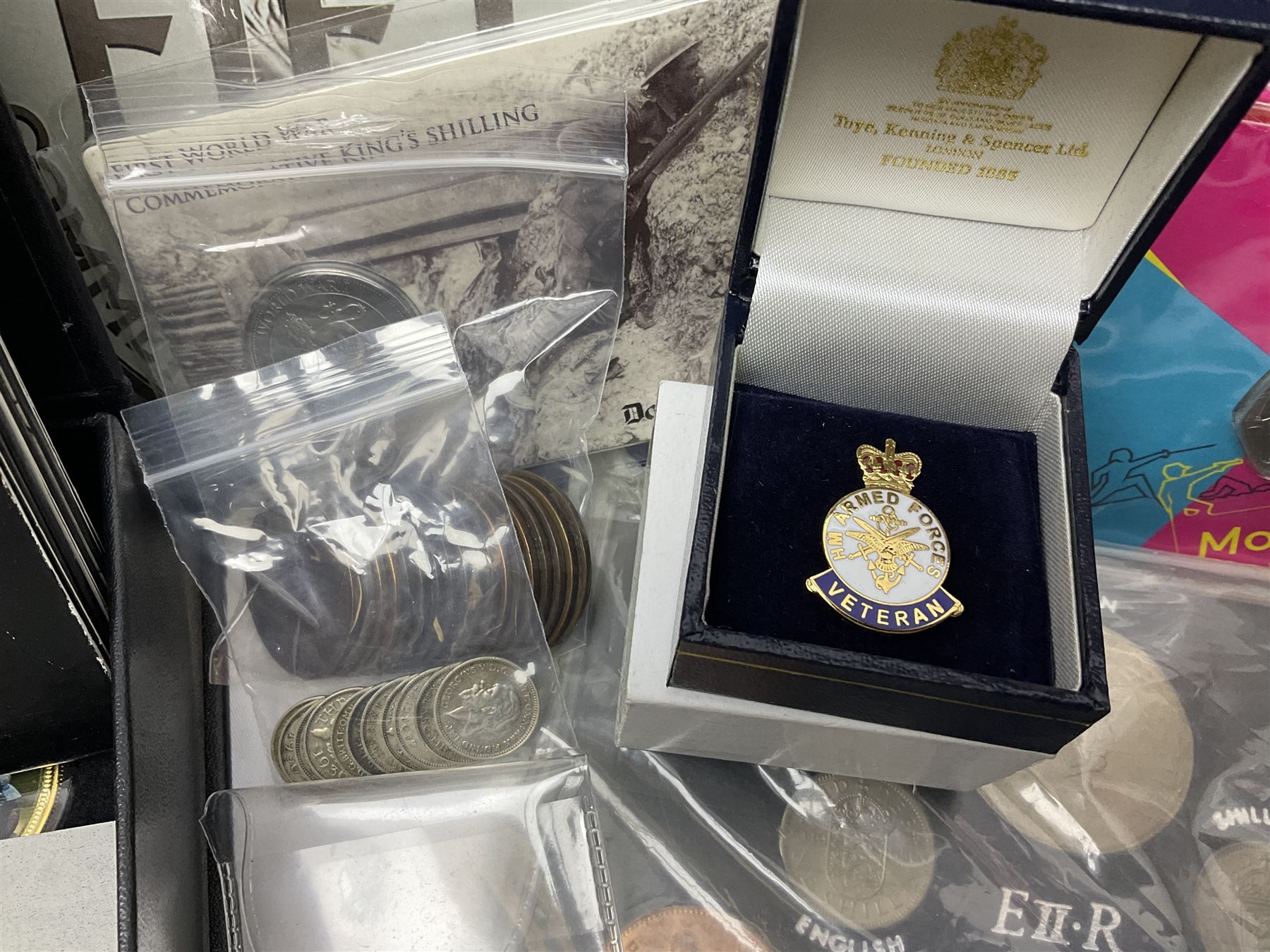 Commemorative and other coinage, including various Queen Elizabeth II 'London 2012 sports collection' fifty pence coins on cards, commemorative crowns, Millennium 2000 'Time Capsule' coin set, channel islands old round one pound coins, part sets etc