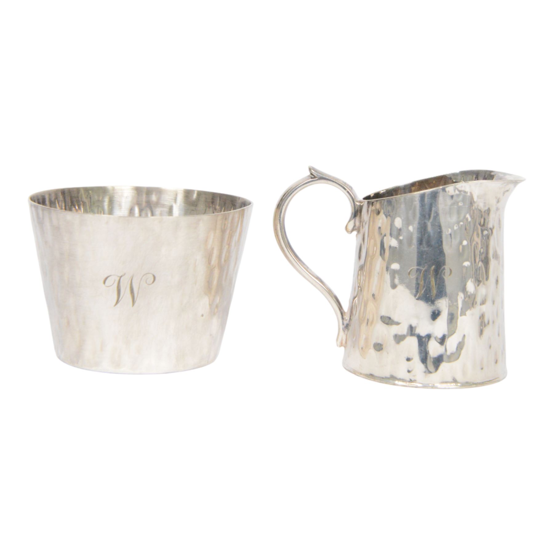 Hukin & Heath planished silver plate coffee tray attributed to Christopher Dresser, with similar coffee set comprising pair of coffee pots, of cylindrical tapering form with strapwork handles, milk jug and open sucrier, all engraved with initial to center, tray L48cm 