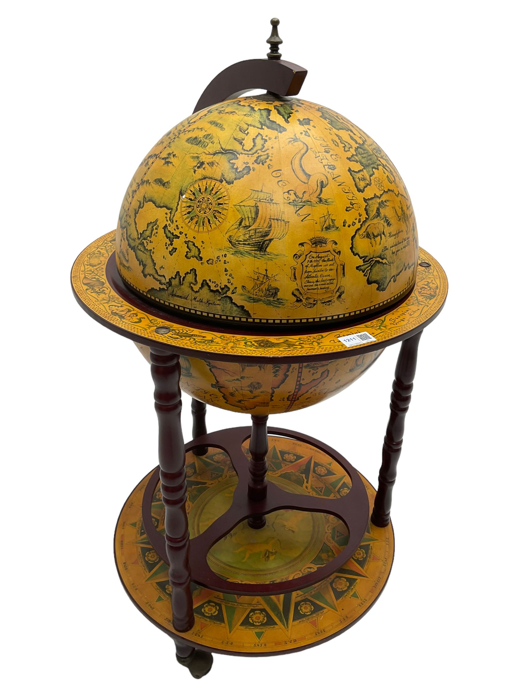 Drinks globe cocktail cabinet trolley, the globe hinges open to reveal drinks holders, turned supports on lower platform, on castors