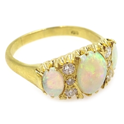  18ct gold three stone opal and six stone diamond ring, hallmarked   