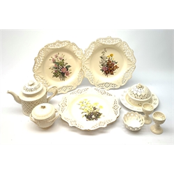 A group of Leeds Creamware, comprising a tea pot, pot and cover, plate, bonbon dish, and egg cups, all with pieced decoration, and a further pot with associated cover, a number of pieces marked beneath Leeds Pottery, plus three Royal Creamware plates. 