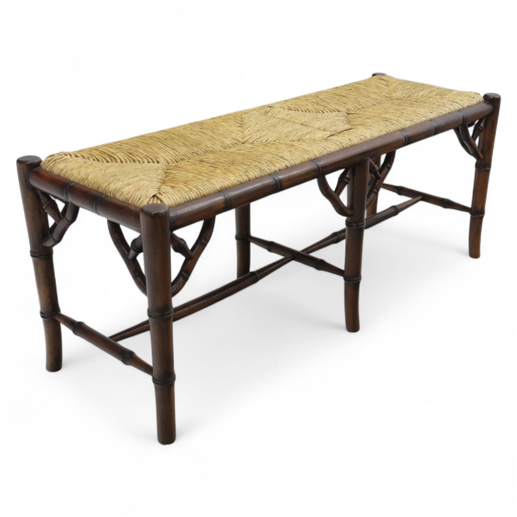 Faux bamboo long stool, stained beech frame with rectangular rush woven seat, rounded rail sides over ring-turned supports, united by side and end stretchers