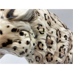 Ronzan fireside model of a snow leopard, with printed mark beneath, H38cm 