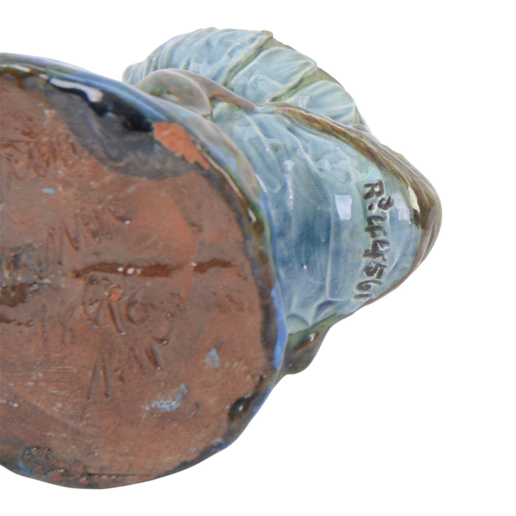 C. H. Brannam pottery Candle holder modelled as a Frog, with  flower upon its back, with signature to base, H8cm 