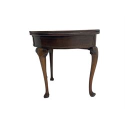 Early 20th century walnut demi-lune side table, fold-over top with hinged storage compartment, on cabriole supports with pointed pad feet, single gate-leg action base
