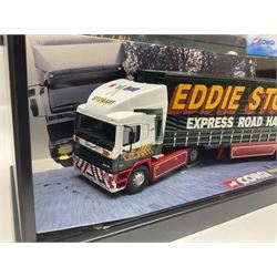 Corgi Eddie Stobart - four heavy haulage vehicles comprising 75201 ERF Curtainside; 75403 Leyland-DAF Curtainside; both in plastic display boxes; CC12610 Scammell Crusader 3 Axle Low Loader; and CC12502 Atkinson Borderer Flatbed Trailer; together with AA30008 Douglas DC-3 Aircraft; all boxed (5)