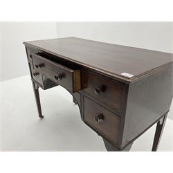 19th century mahogany kneehole dressing table desk, moulded rectangular top over five drawers, square tapering supports with brass and ceramic castors