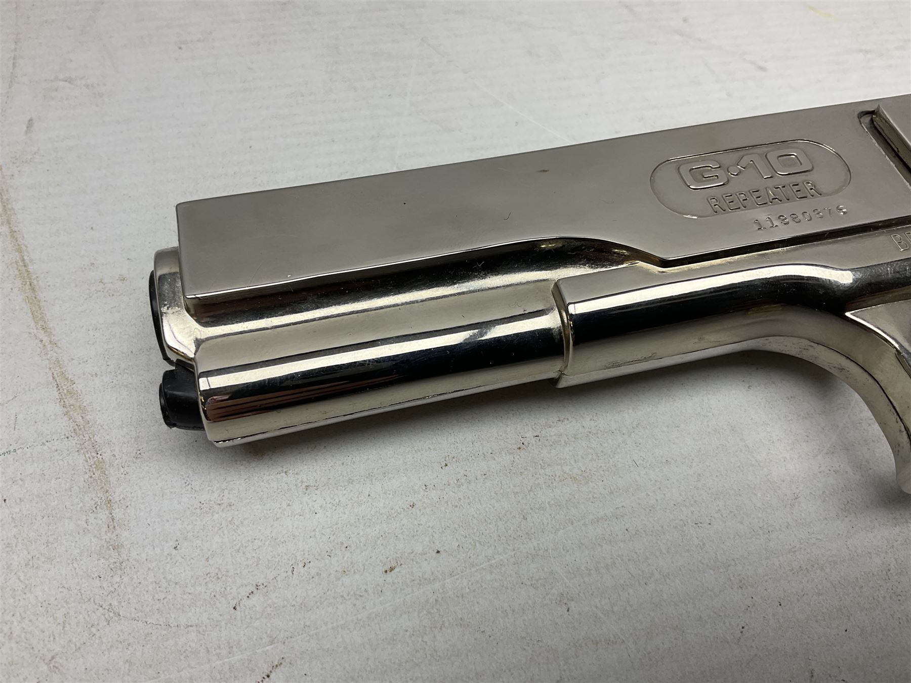G-10 .177 20-shot BB Repeater air pistol with deluxe nickel plated finish; boxed with instructions