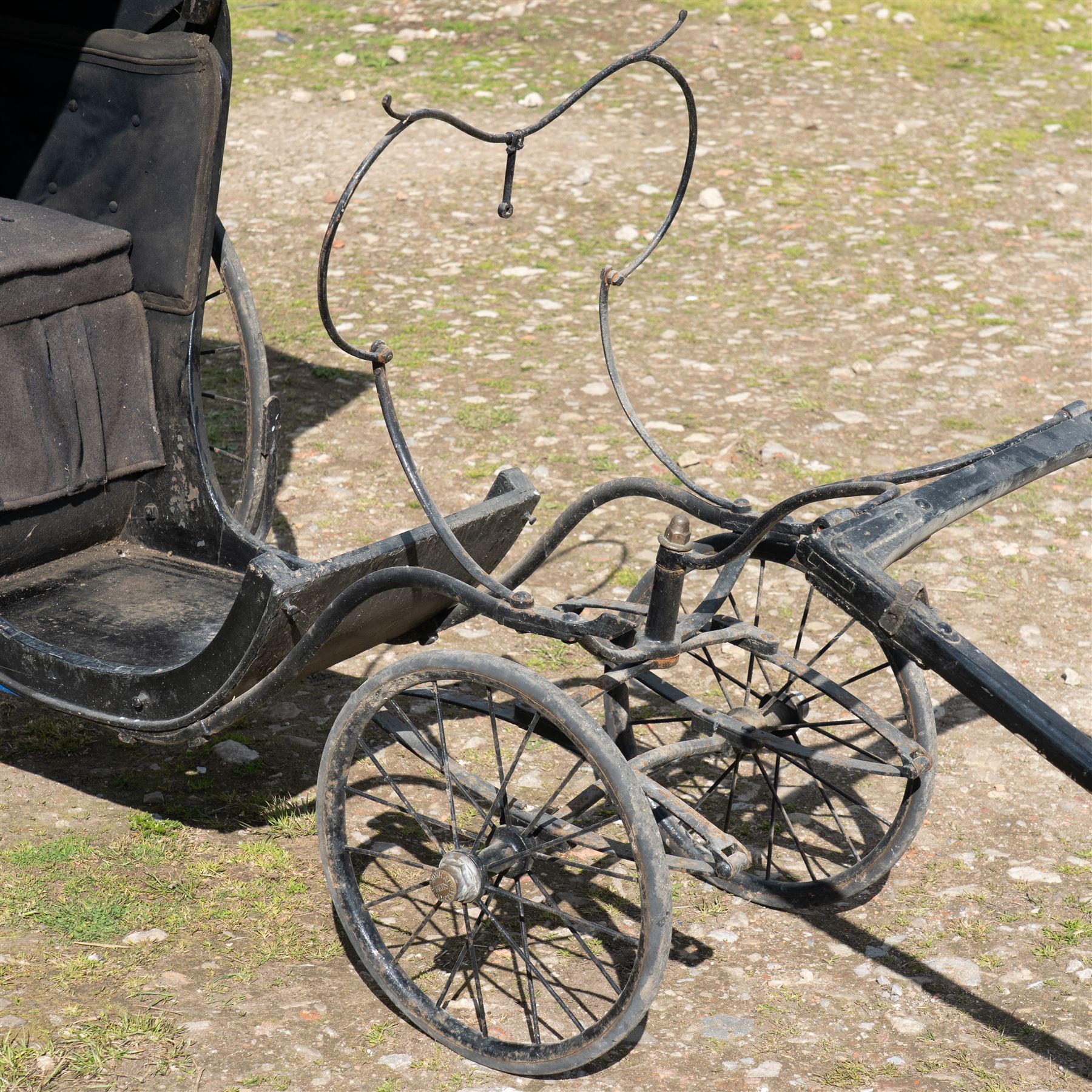 Victorian Bath Chair / Invalid Carriage Converted for Horse Drawn Use

A Victorian bath chair or invalid carriage, later converted for horse drawn use, with black painted bodywork, blue side panels, folding black leather hood and upholstered single passenger seat. The carriage is fitted with large rear wire spoked wheels, smaller front steering wheels, long shafts, footwell and curved body sides, consistent with a late nineteenth century invalid carriage or bath chair form adapted for pony or light horse use.

Features

Bath chair or invalid carriage form
Later converted for horse drawn use
Folding black leather hood
Single upholstered passenger seat
Deep footwell
Black painted body with blue side panels
Large rear wire spoked wheels
Smaller front steering wheels
Long shafts
Lightweight carriage frame

Dimensions:
Overall length: 380 cm
Body length: 204 cm
Width: 88 cm
Height: 178 cm

Wheel Diameters:
Front wheels: 47 cm
Rear wheels: 88 cm

Seating:
Driver: 1
Passenger: None