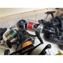 Collection of mostly sea fishing reels, including Mitchell Riptide, Shakespeare Sea Wolf, Daiwa Sealine, Abu Garcia Ambassadeur XLT 1 Synchro , in two boxes