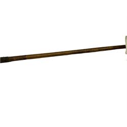 Golf - late 19th century unmarked smooth faced rut or track iron with hickory shaft L101cm