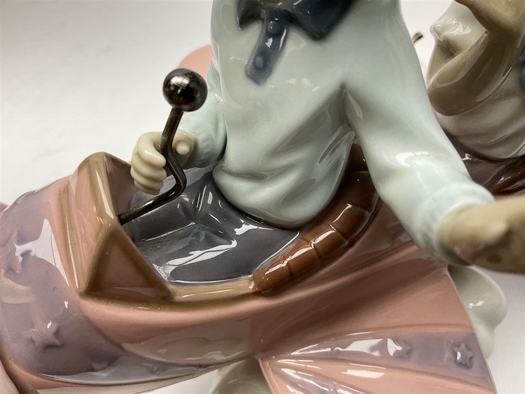 Lladro figure, Don't Look Down, modelled as a girl and boy in a plane, sculpted by Joan Coderch, no 5698, year issued 1990, year retired 2004, H17cm