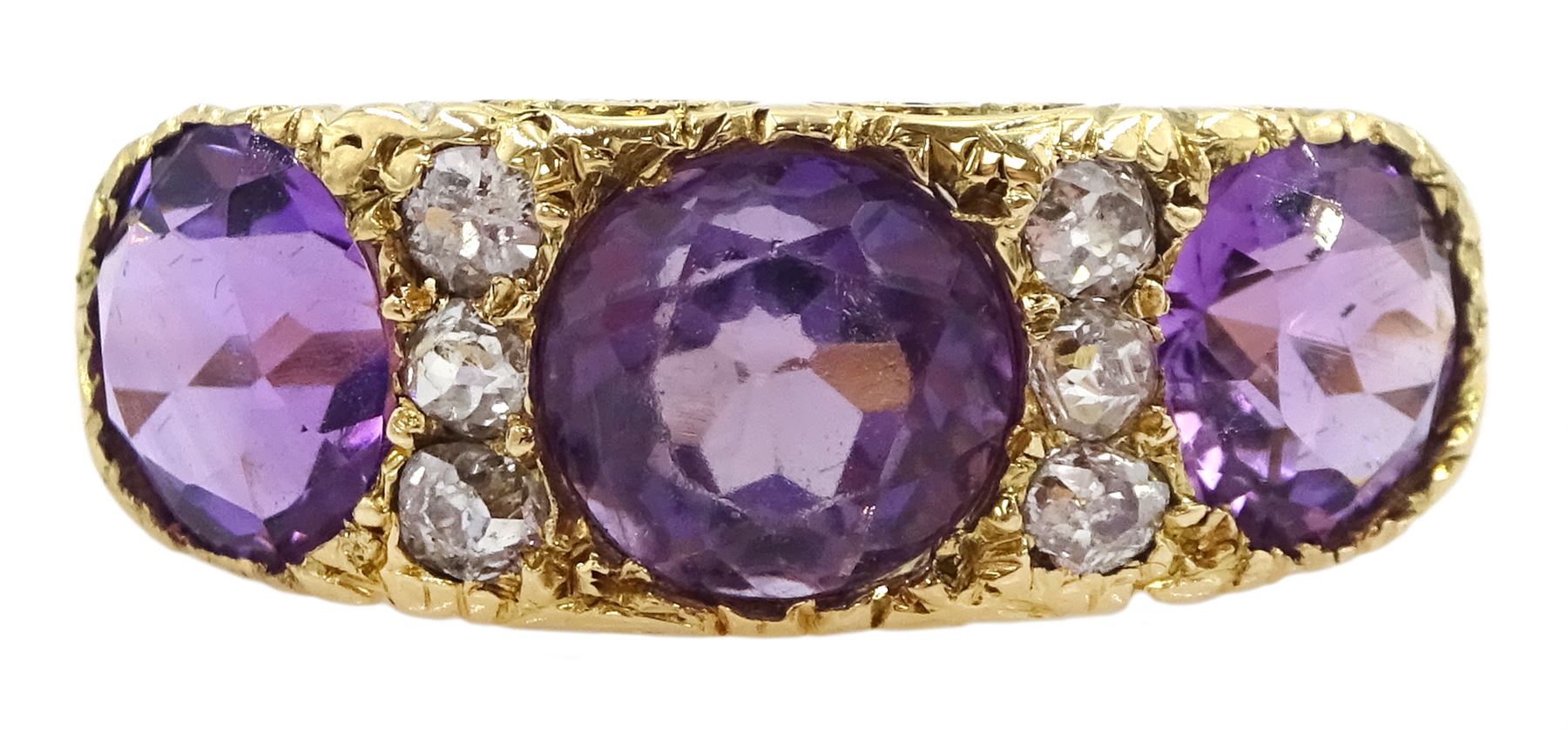 Dutch gold three stone round cut amethyst and six old cut diamond ring, stamped, total amethyst weight approx 3.95 carat