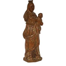 17th century carved limewood figure of a saint, with traces of original gilding, H22.5cm