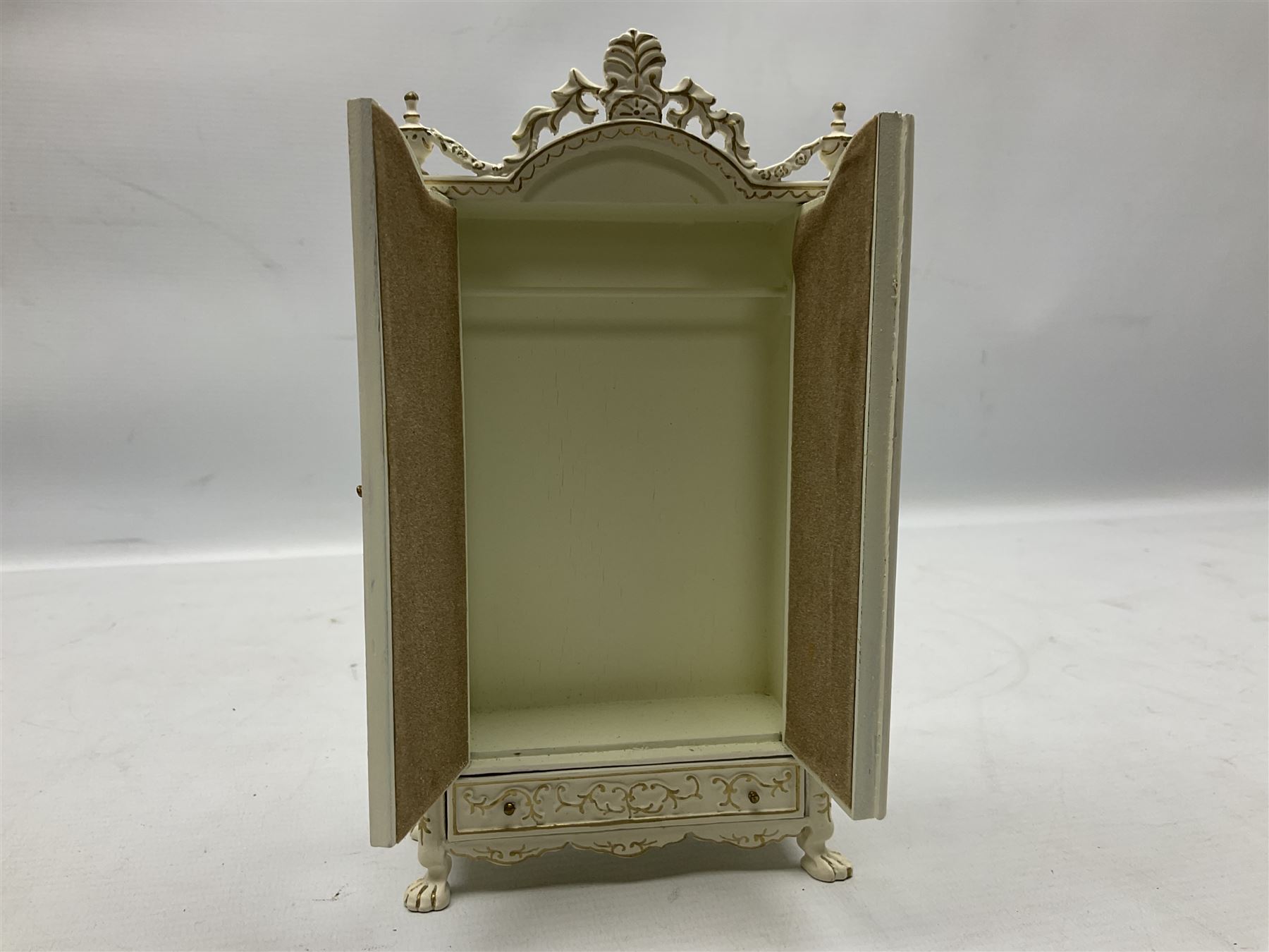 Collection of miniature dolls house furniture, to include five drawer chest painted with blossom, cream and gilt double door mirrored wardrobe, four piece lacquered style desk set, three piece suite, writing desk, wash stand, Knoll style sofa etc (14)