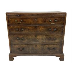 George III mahogany bachelors chest, fitted with slide above four graduating drawers, crossbanded top