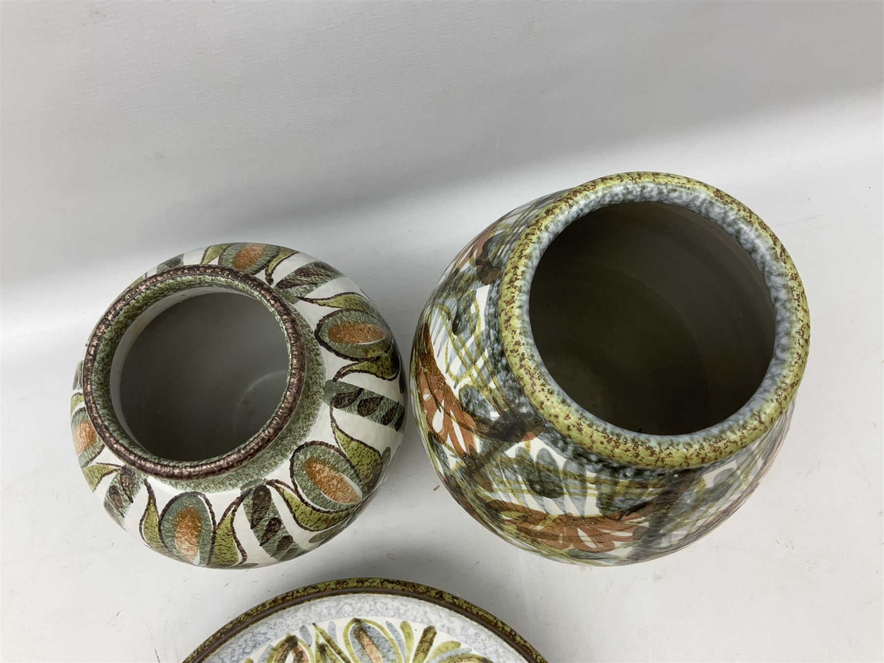 Three pieces of Denby stoneware, comprising Glyn Colledge vase,  H30cm, Glyn Colledge dish, D32cm, and further similar vase 