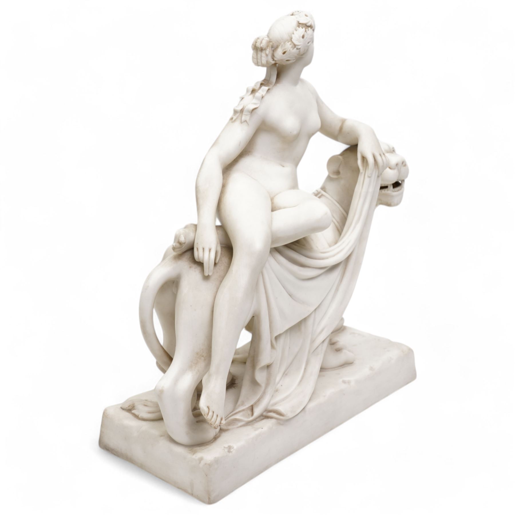 Victorian Minton Parian ware group 'Ariadne and the Panther', the nude maiden seated side-saddle astride a panther, her fingers holding a drape, with impressed Minton and 1863 date marks to rectangular base, L29cm x H36cm
