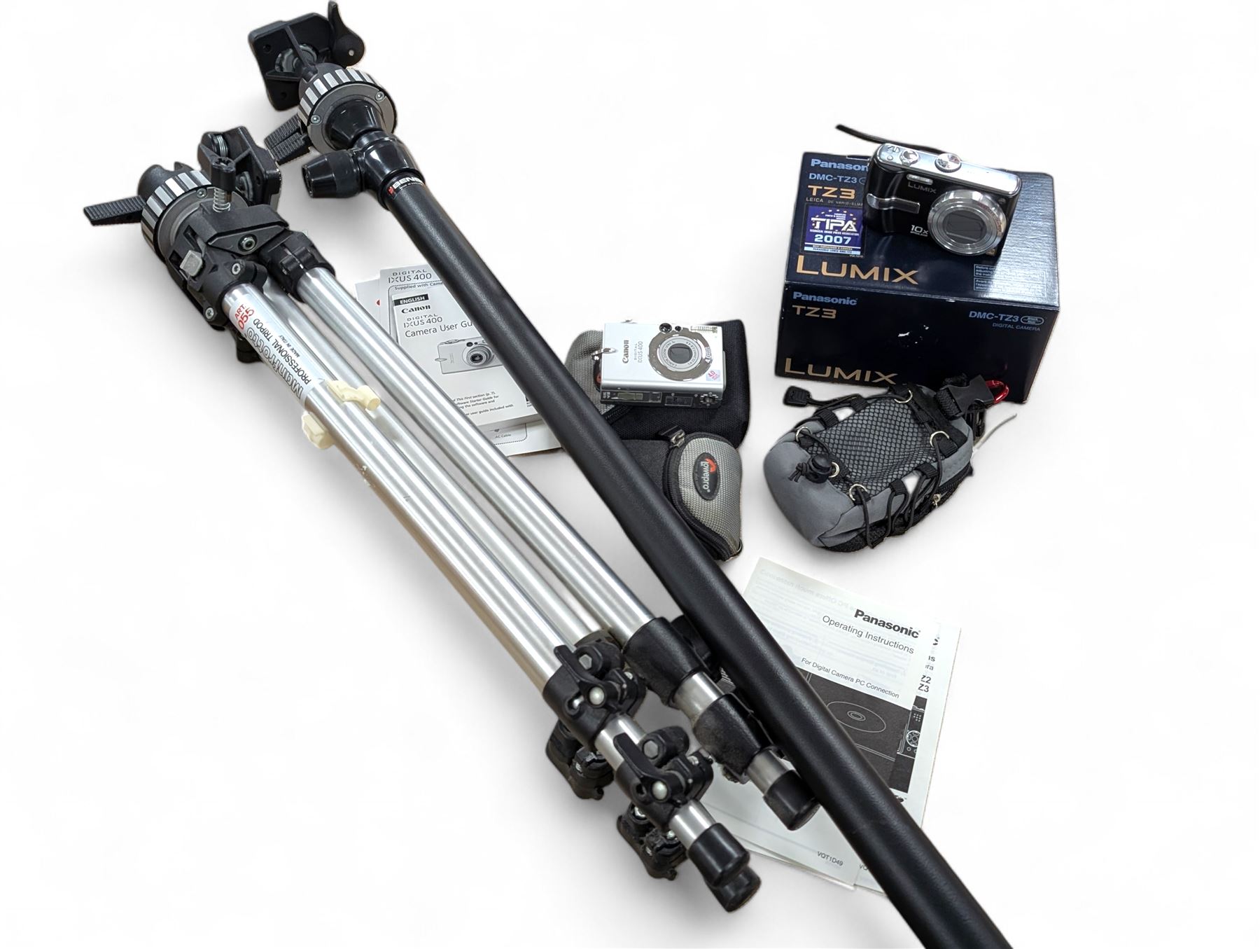 Two compact digital cameras, comprising Panasonic Lumix DMC-TZ3 digital camera, with Leica DC Vario Elmar 1:3.3-4.9/4.6-46 ASPH lens, with carry case, battery, charger, instructions and box and Canon Ixus 400 with carry case and instructions, Manfrotto Professional Tripod and a Benbo monopod