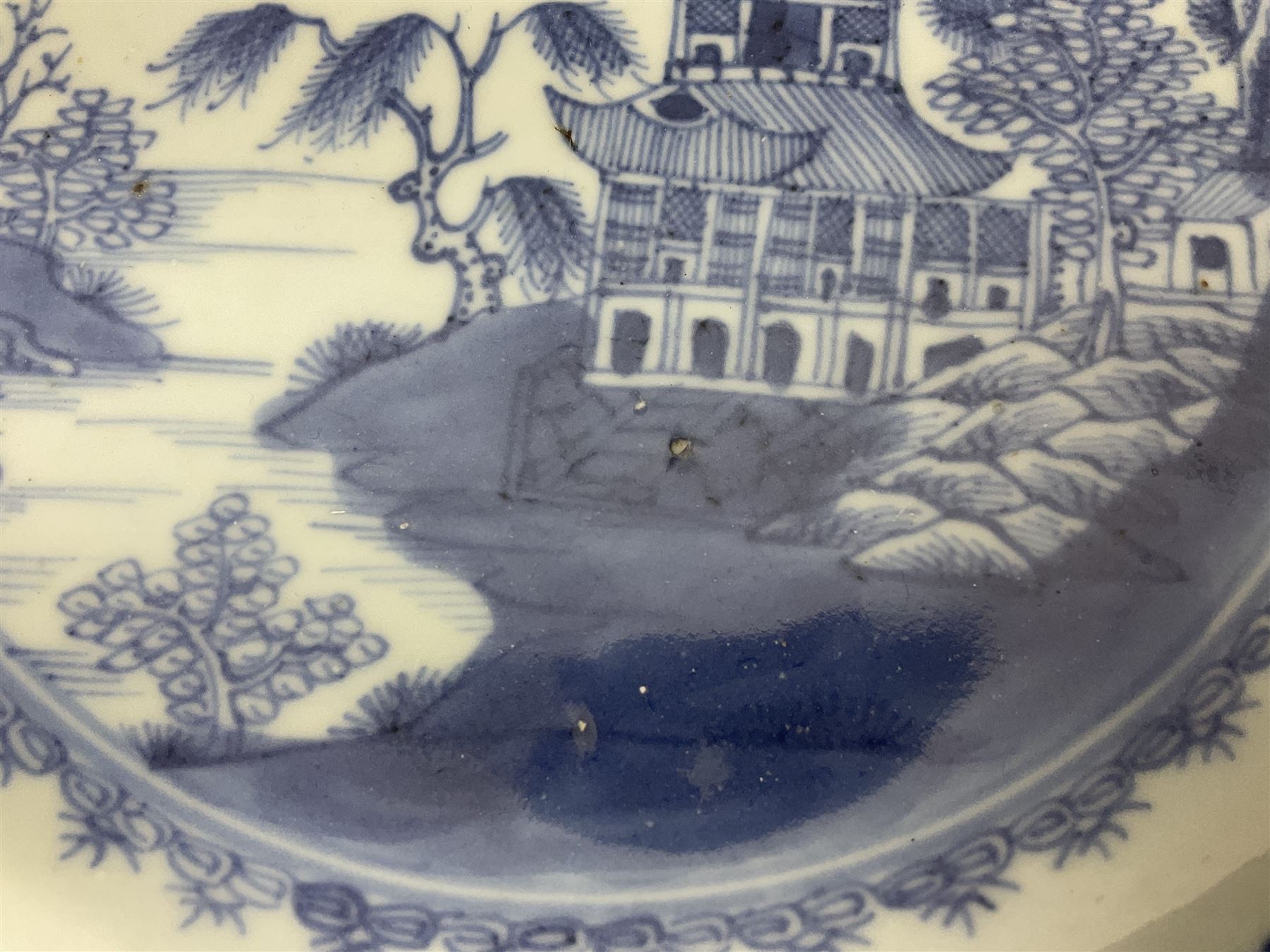18th century Chinese export blue and white plate of octagonal form, with a pagoda landscape, D23cm