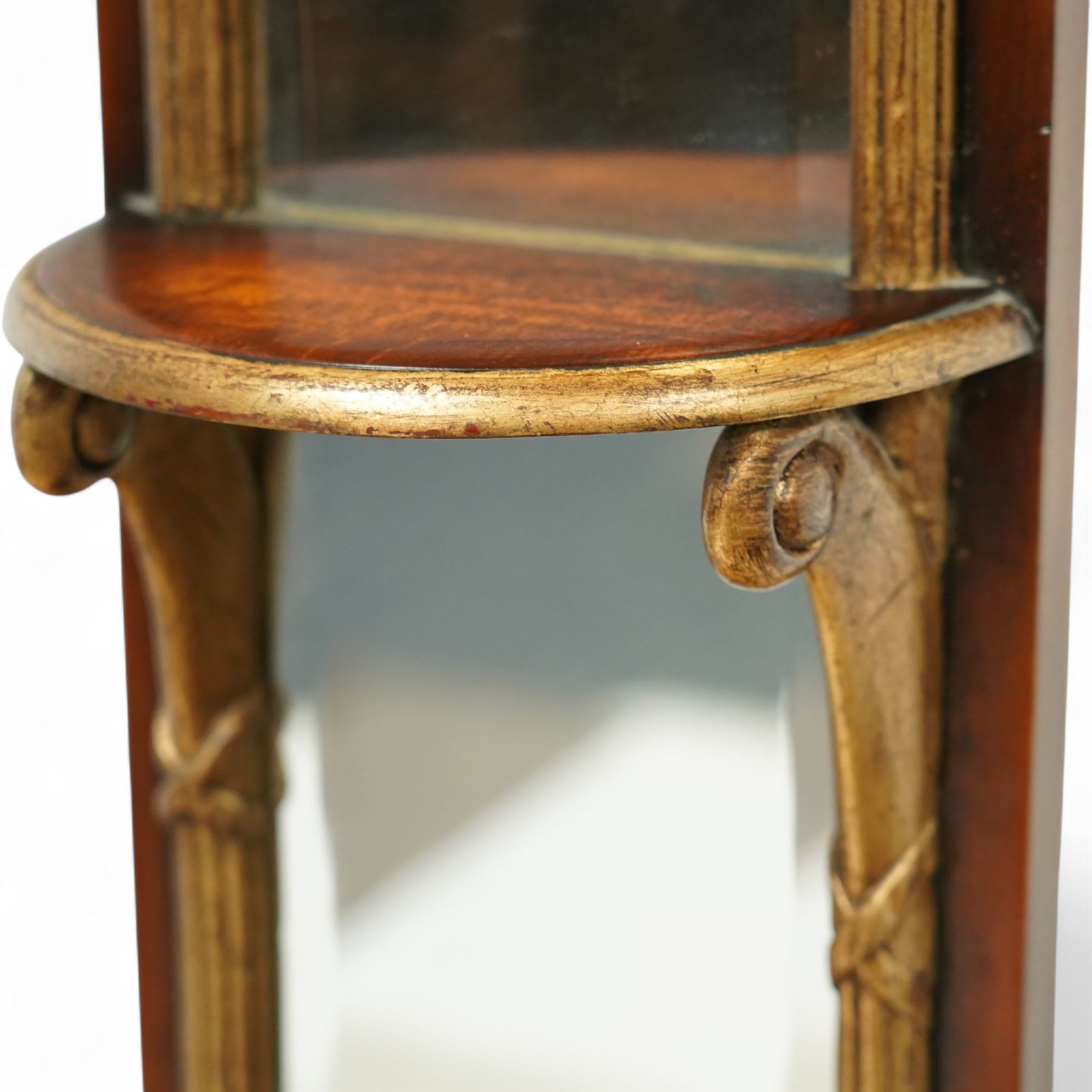 Theodore Alexander - three contemporary neoclassical design giltwood and mahogany three-sectional pier mirrors, broken pediment with central bronze urn finial above triple mirror plates, flanked by gilt acanthus-carved supports and moulded frame 