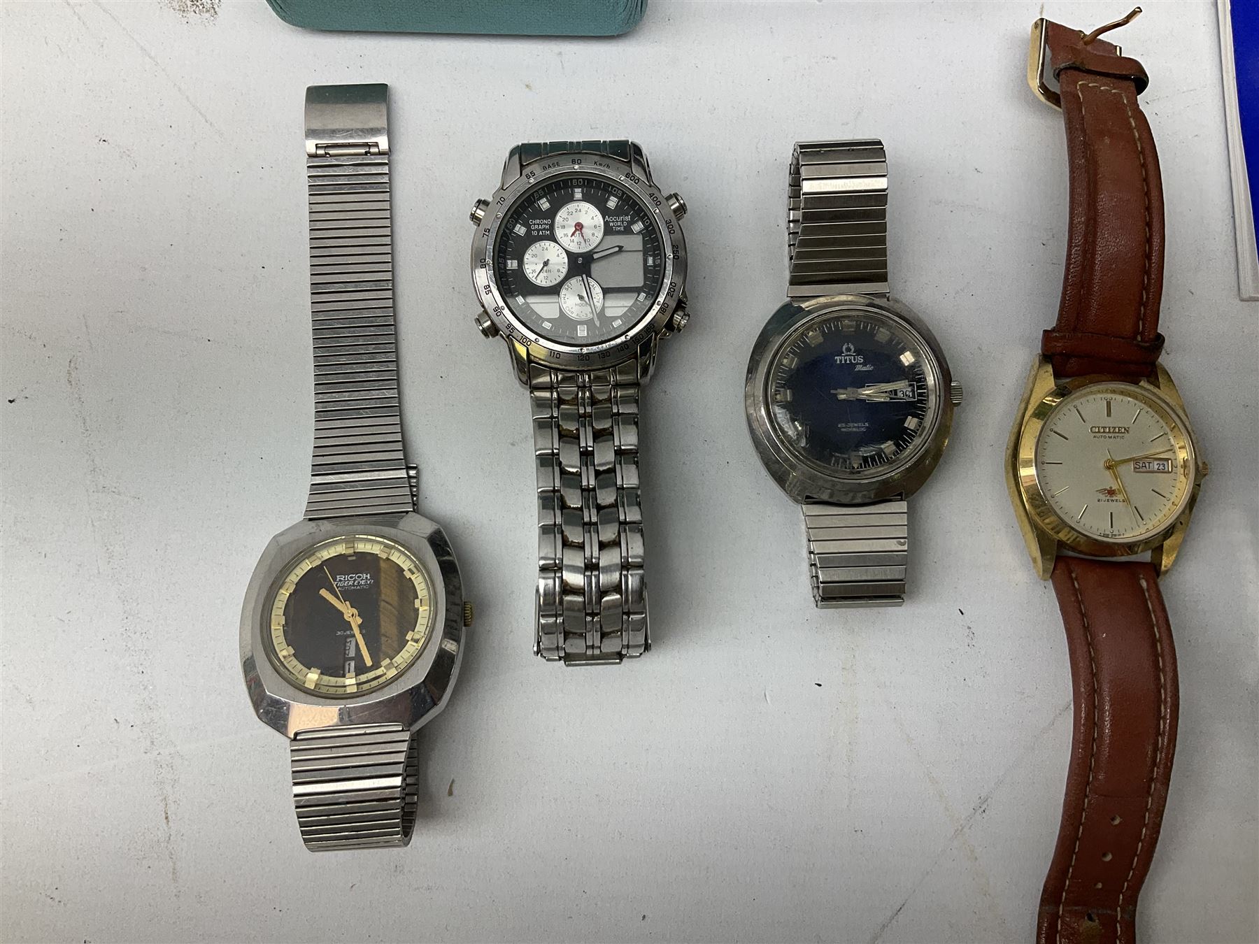 Collection of wristwatches including Accurist World Time chronograph quartz, Lorus chronograph 100m stainless steel quartz, Oskar Emil Torrini, two Citizen automatics, Seiko ladies Vivace, Titus, Limit and Tissot