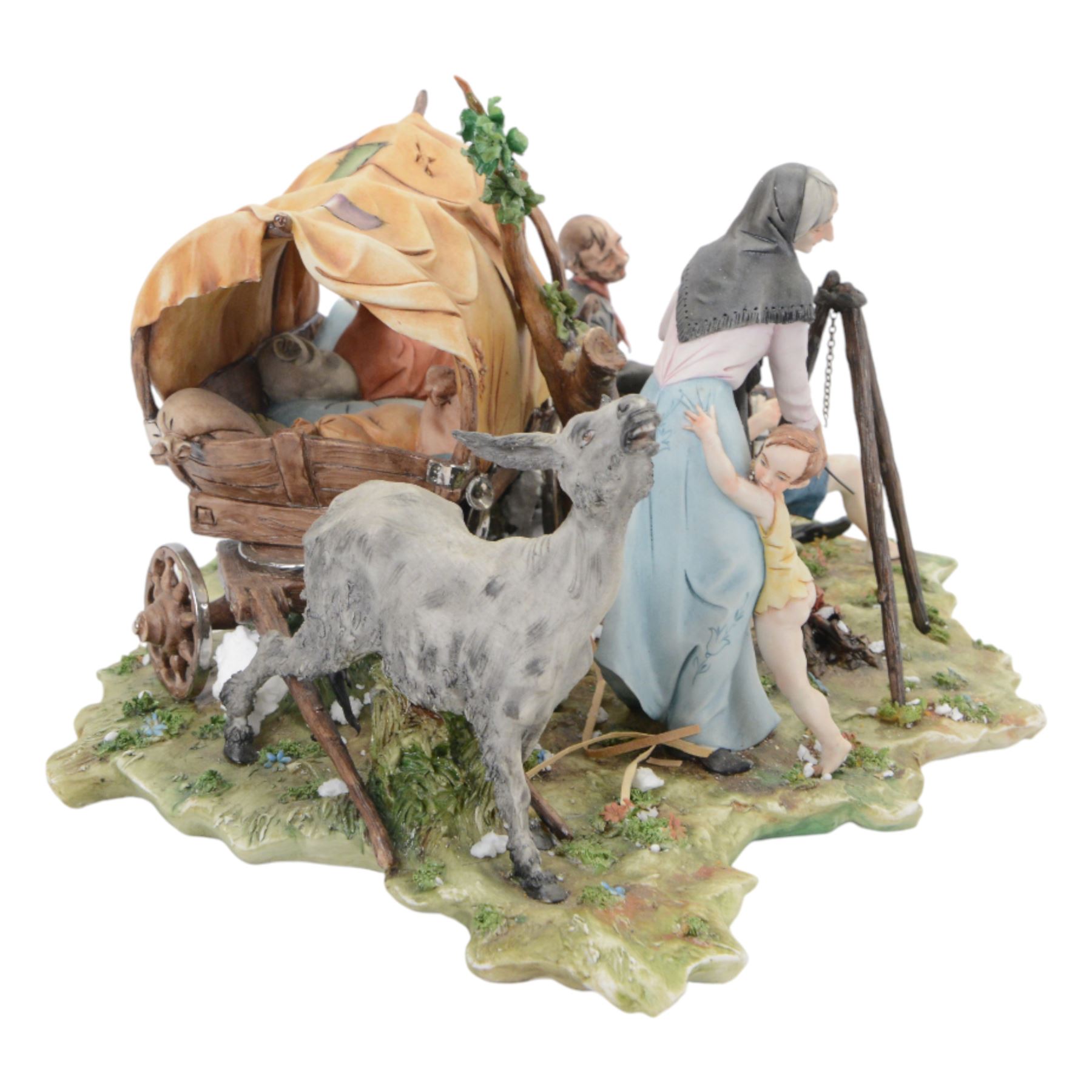 Capodimonte figural group of a gypsy encampment including wagon, cooking fire and people, H21cm