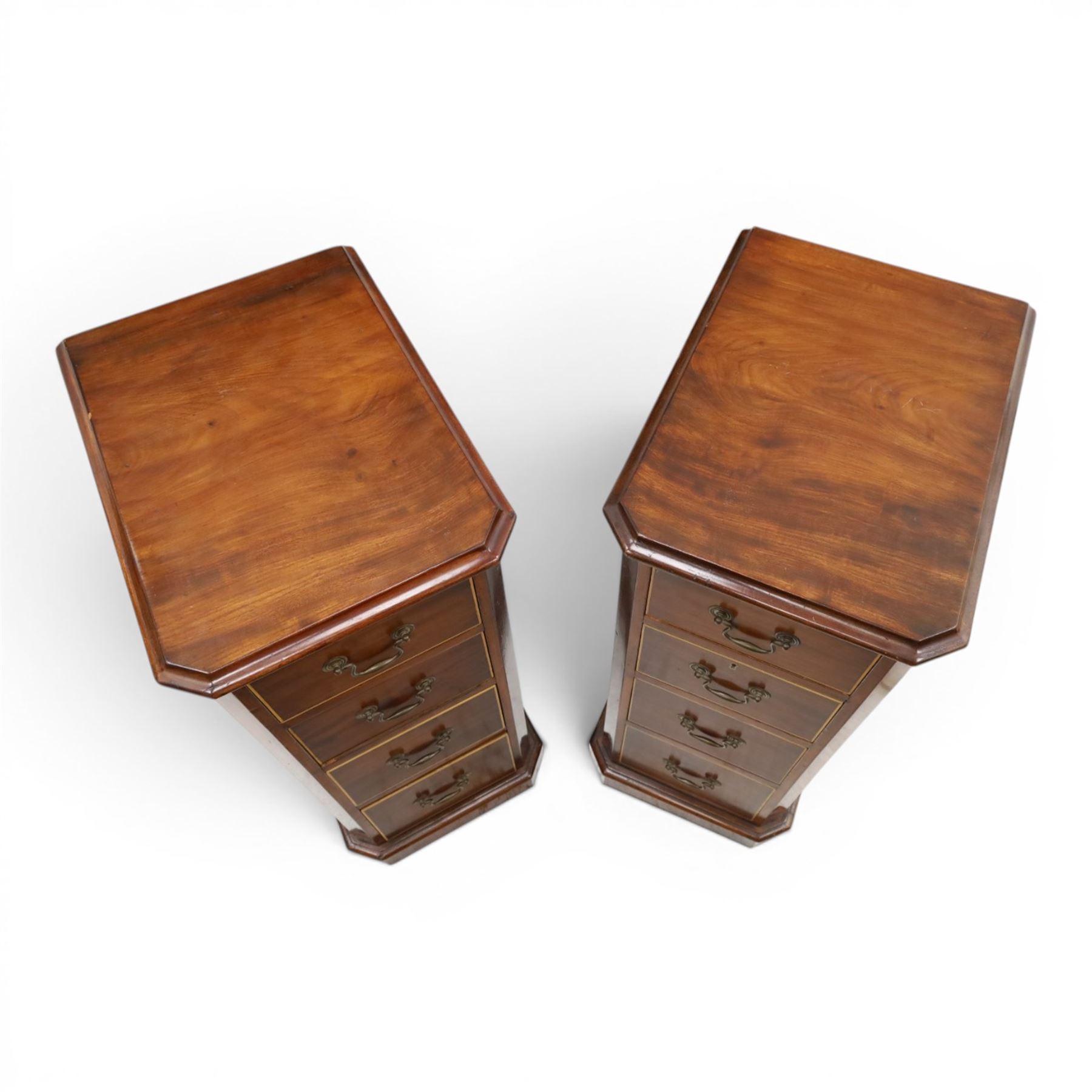 Pair of Edwardian mahogany pedestal chests, of moulded rectangular form, above four graduated drawers, brass swan neck handles, moulded plinth base