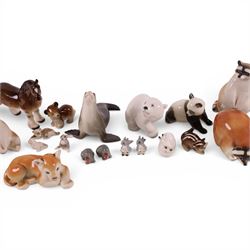 Collection of USSR Lomonosov figures, including racoons, sea lion, horse, lion cubs etc 
