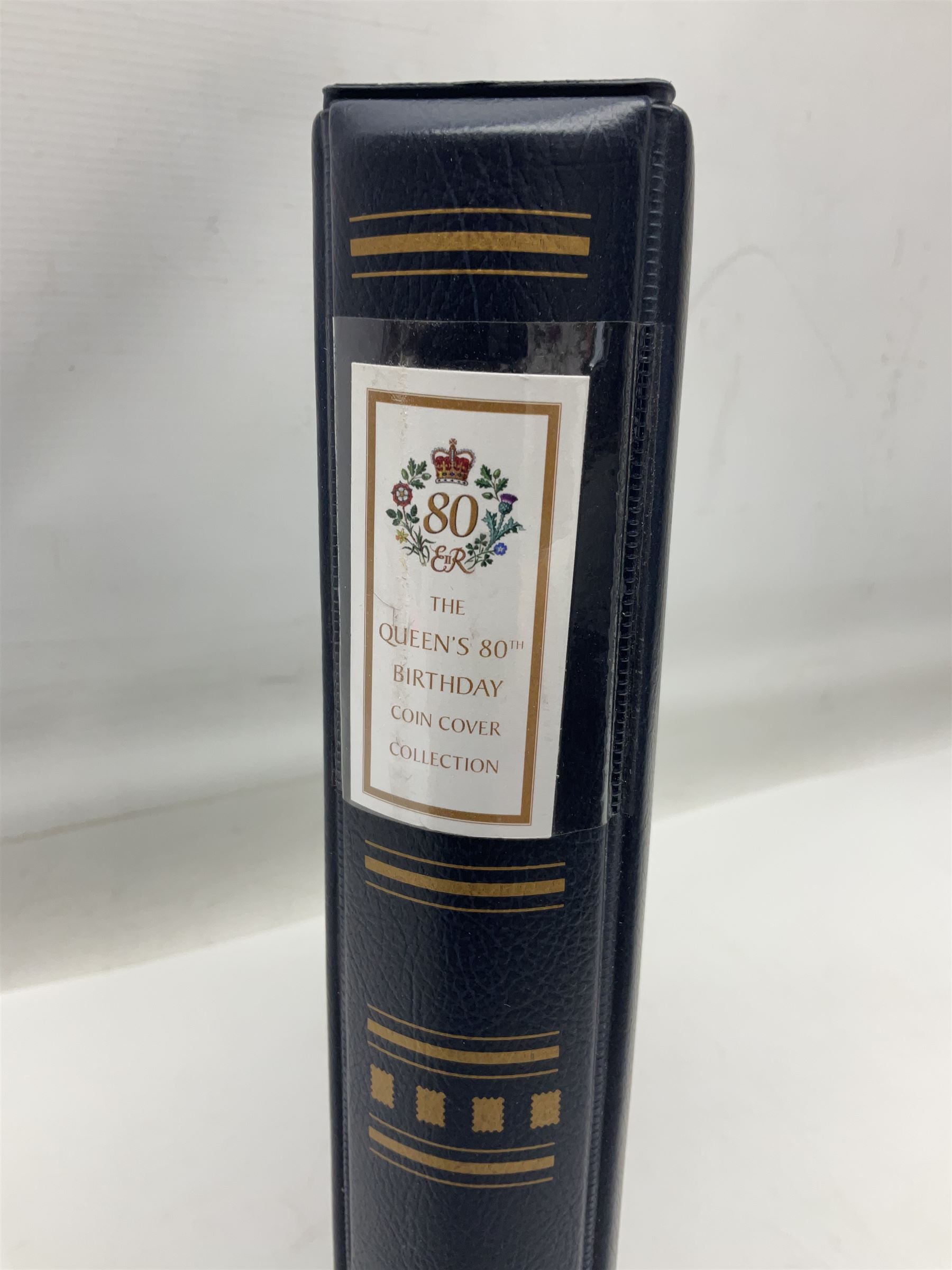 Stamp and coin covers, including 2006 'Her Majesty Queen Elizabeth II 80th Birthday' containing five pounds coin, first day covers relating to Diana Princess of Wales etc, housed in a ring binder folder