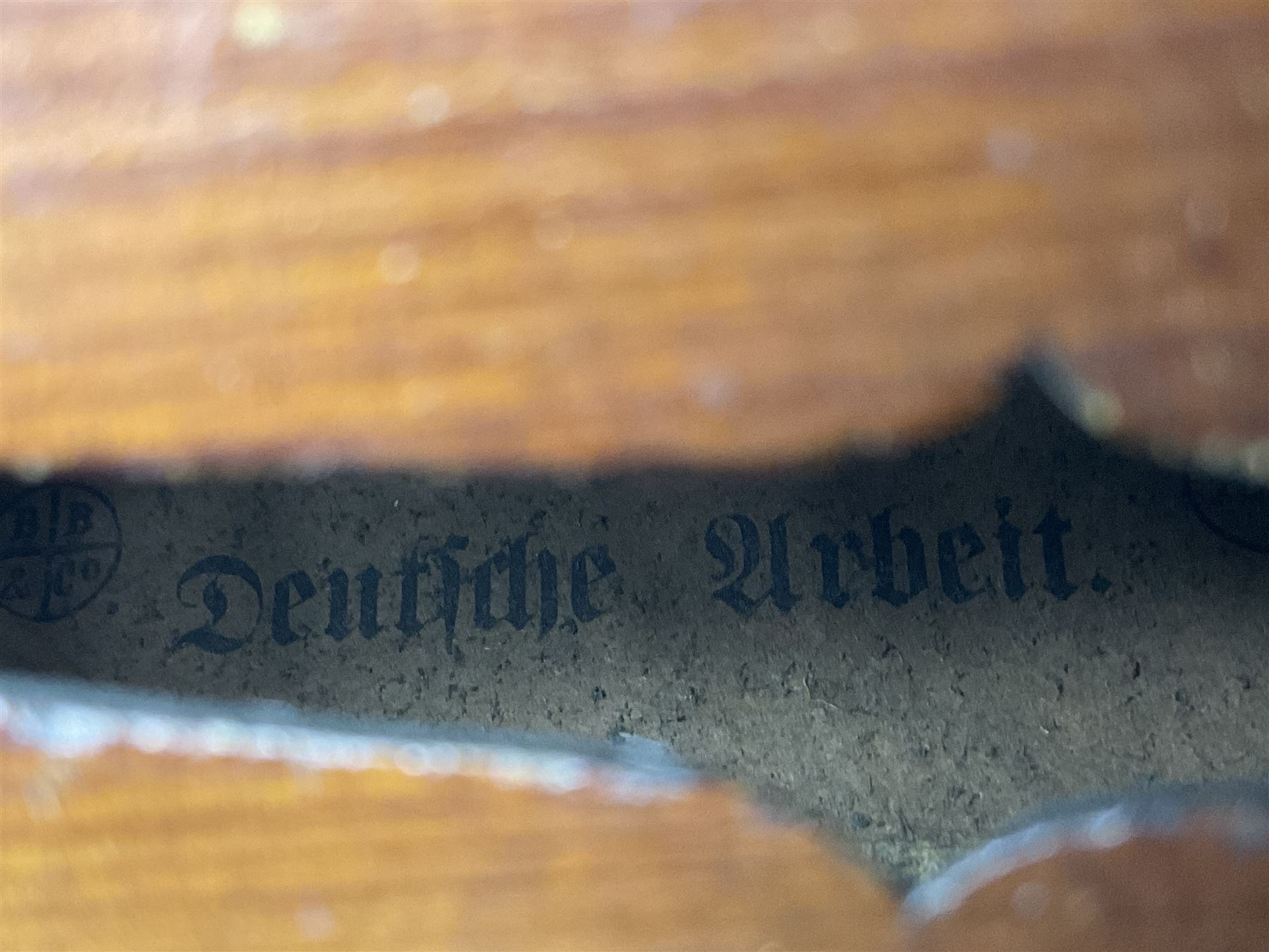 German copy of a Maggini violin c1900 with 35.5cm two-piece maple back and ribs and spruce top, bears label 'Maggini Deutsche Arbeit 1866' L59cm; in carrying case with bow