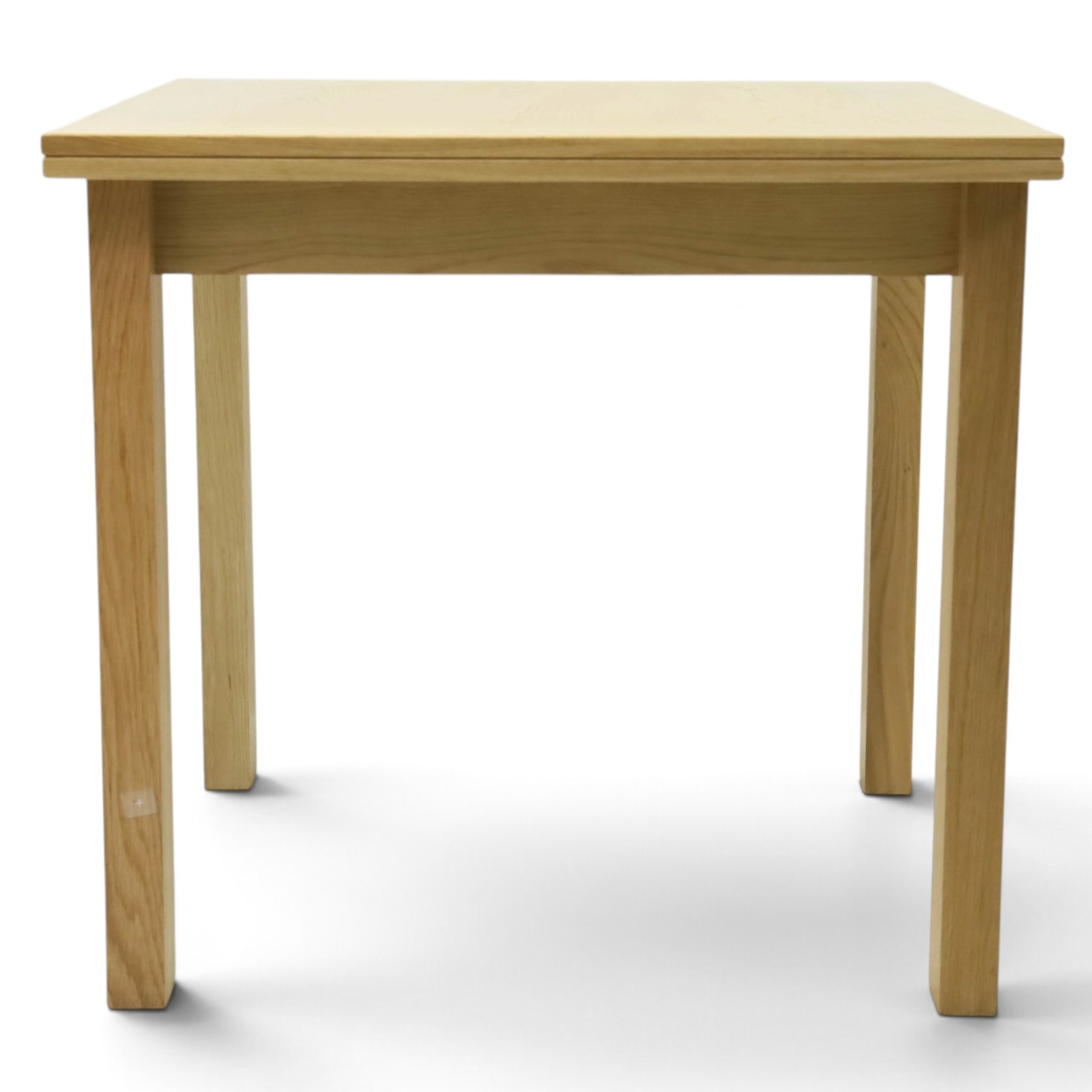 Contemporary light oak extending dining table, the square top with pull-out and fold-over action, raised on square supports