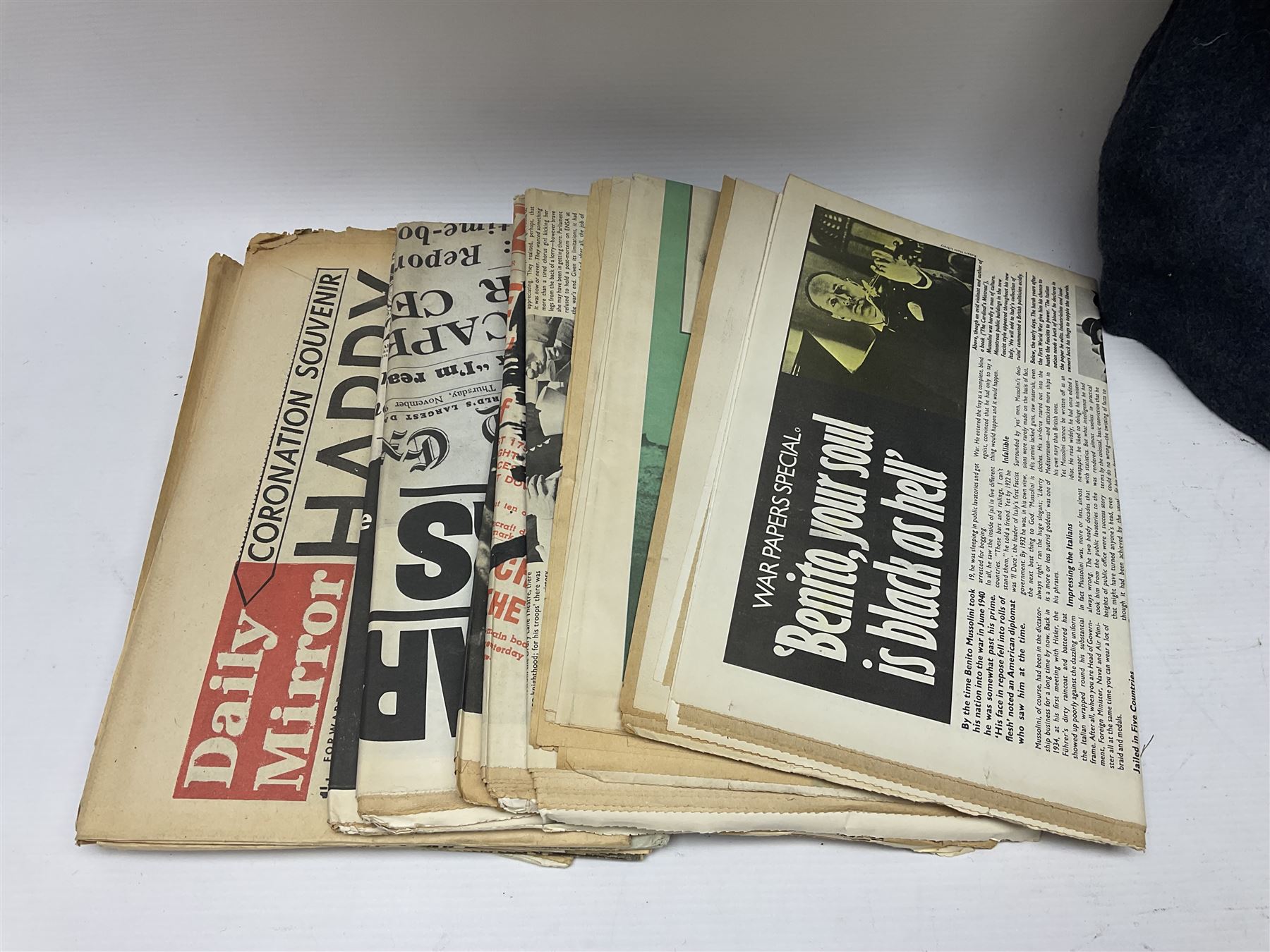 British RAF uniform, including jacket and trousers, modern RAF uniform buttons and a collection of reproduction wartime newspapers