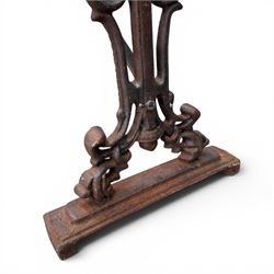 Pair of Victorian cast iron table end supports, of pierced and scrolling foliate design with central masks, united by X-form stretcher, with later top