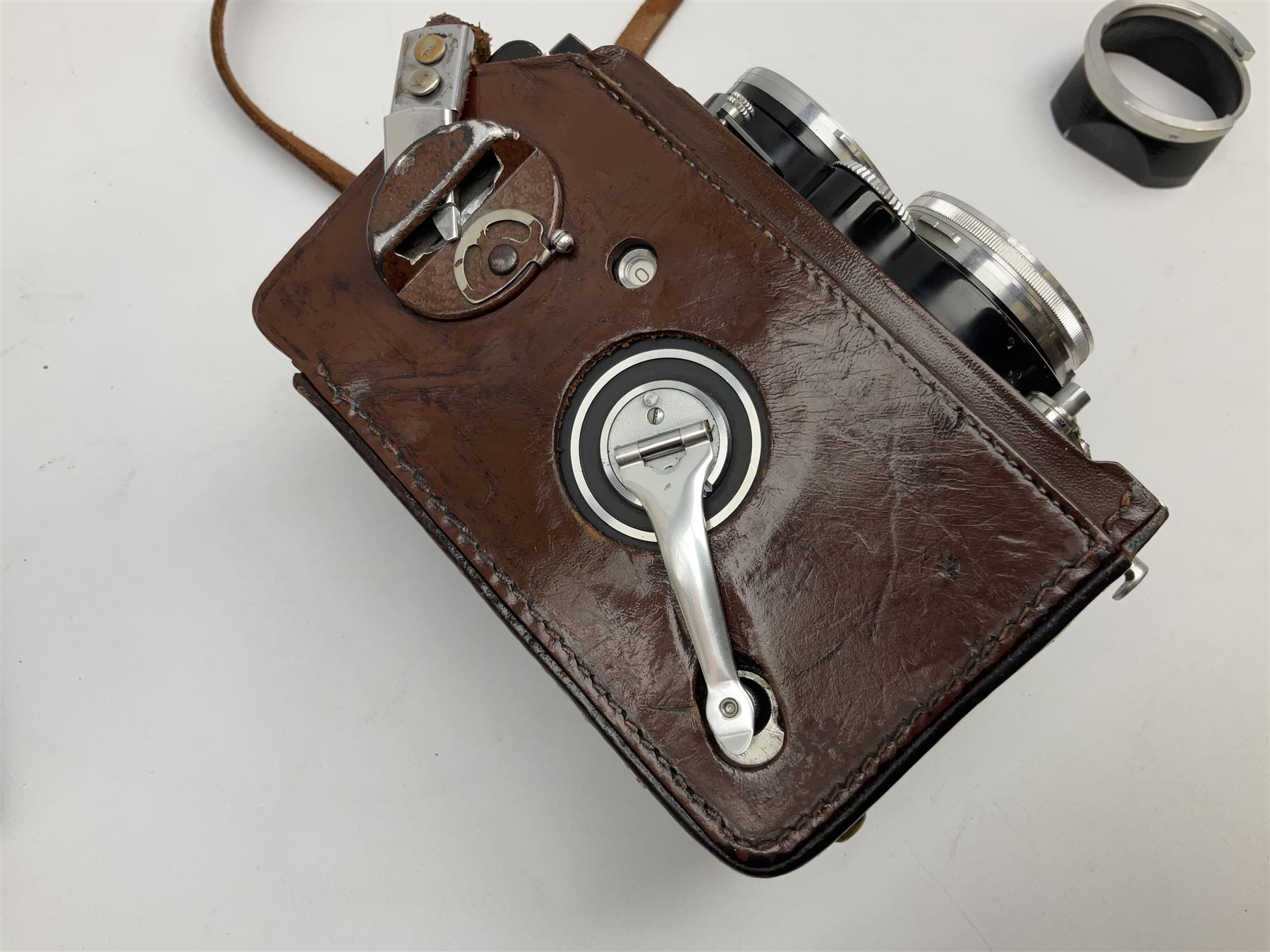 Franke & Heidecke Synchro-Compur Rolleiflex camera, twin lens camera, serial number 2447615, with viewing lens '1:2.8/80 Heidosmat No. 857174', Taking Lens '1:2.8/80 Carl Zeiss Planar No. 4189283', in leather case