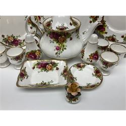 Royal Albert Country Roses pattern part tea and dinner service, to include teapot, four cups and saucers, four dessert plates, cake plate etc, (41)