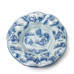 Early 18th century Frankfurt tin glazed earthenware shallow dish decorated in blue with pa...