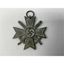 WW2 German Eastern Front Medal awarded to those who served on the German Eastern/Russian Front during the Winter Campaign period of 15th November 1941 to 15th April 1942 with original ribbon; and German War Merit Cross with swords 2nd Class (2)