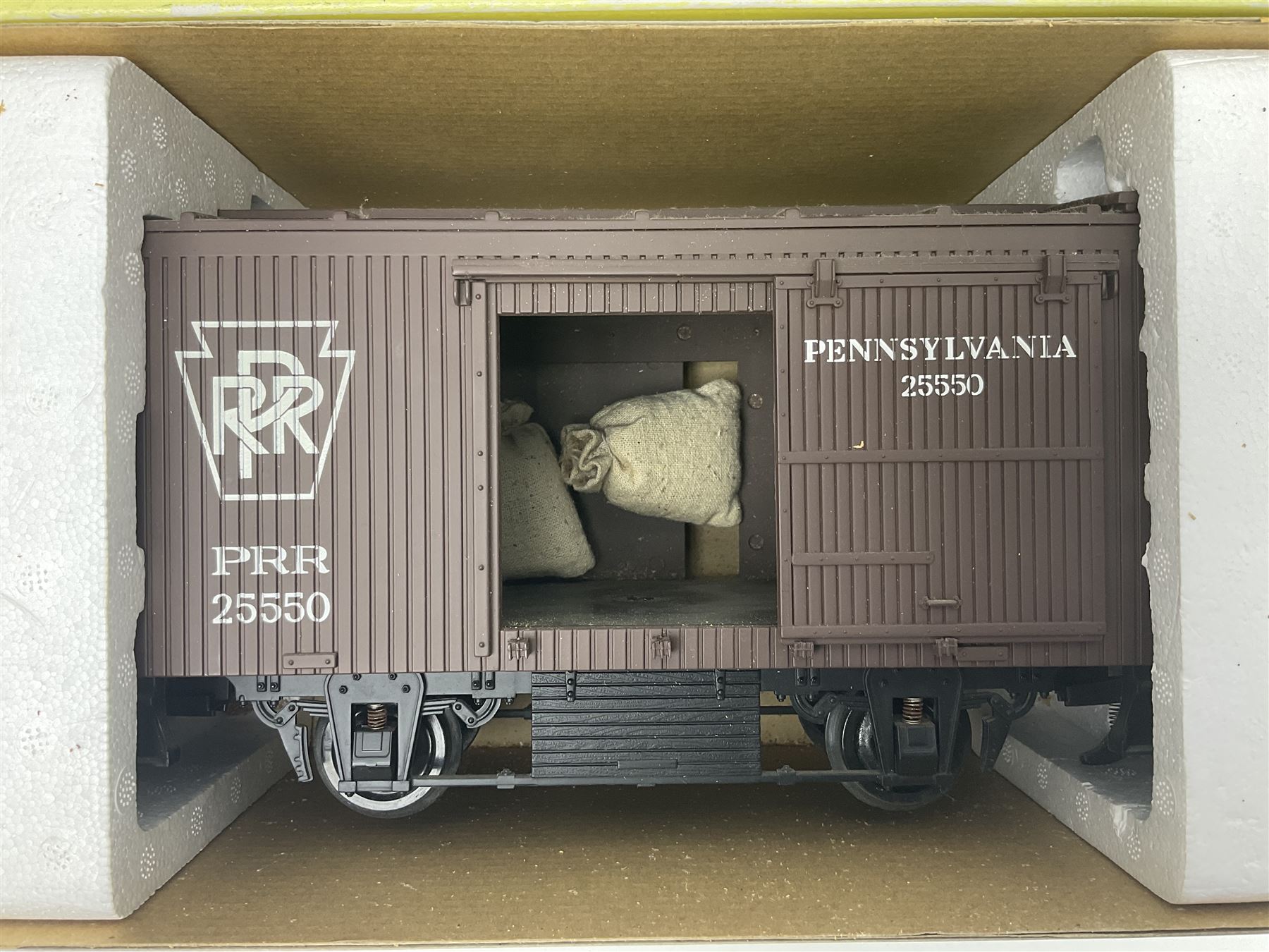 LGB (Lehmann Gross Bahn) G scale, gauge 1 - 0-4-0 tank locomotive No.995001; unboxed; and two American Aristo Craft Trains 2-axle boxcars Santa Fe and Pennsylvania; both boxed (3)