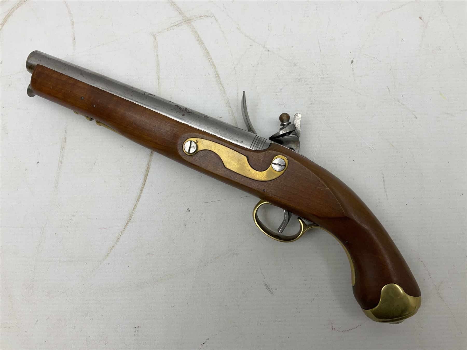 Reproduction non-firing flintlock pistol with brass skull crusher butt, the lock-plate inscribed 'Tower' and 'GR' L40cm; Sabre Japan Original Bowie Knife in sheath; and Indian embossed nickel two-piece walking cane (3)