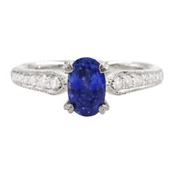 Platinum sapphire and diamond ring, single oval cut sapphire of approx 0.95 carat, with mi...