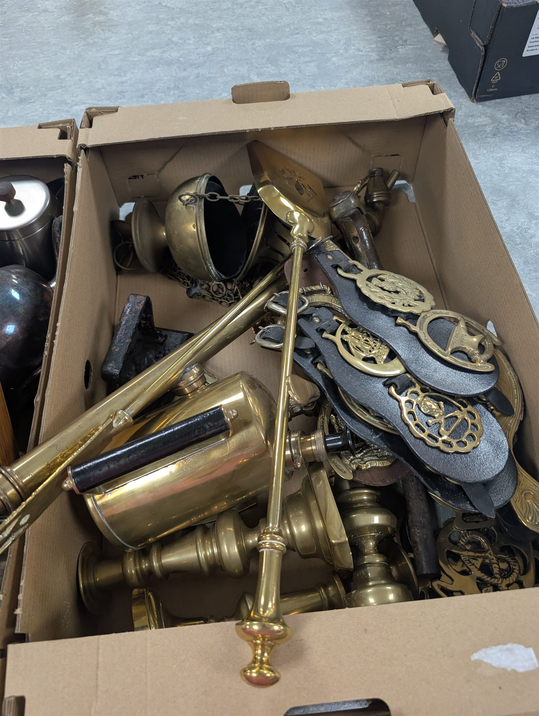 Collection of silver plate and brassware, including canteen of cutlery, horse brasses, candlesticks, teapots etc