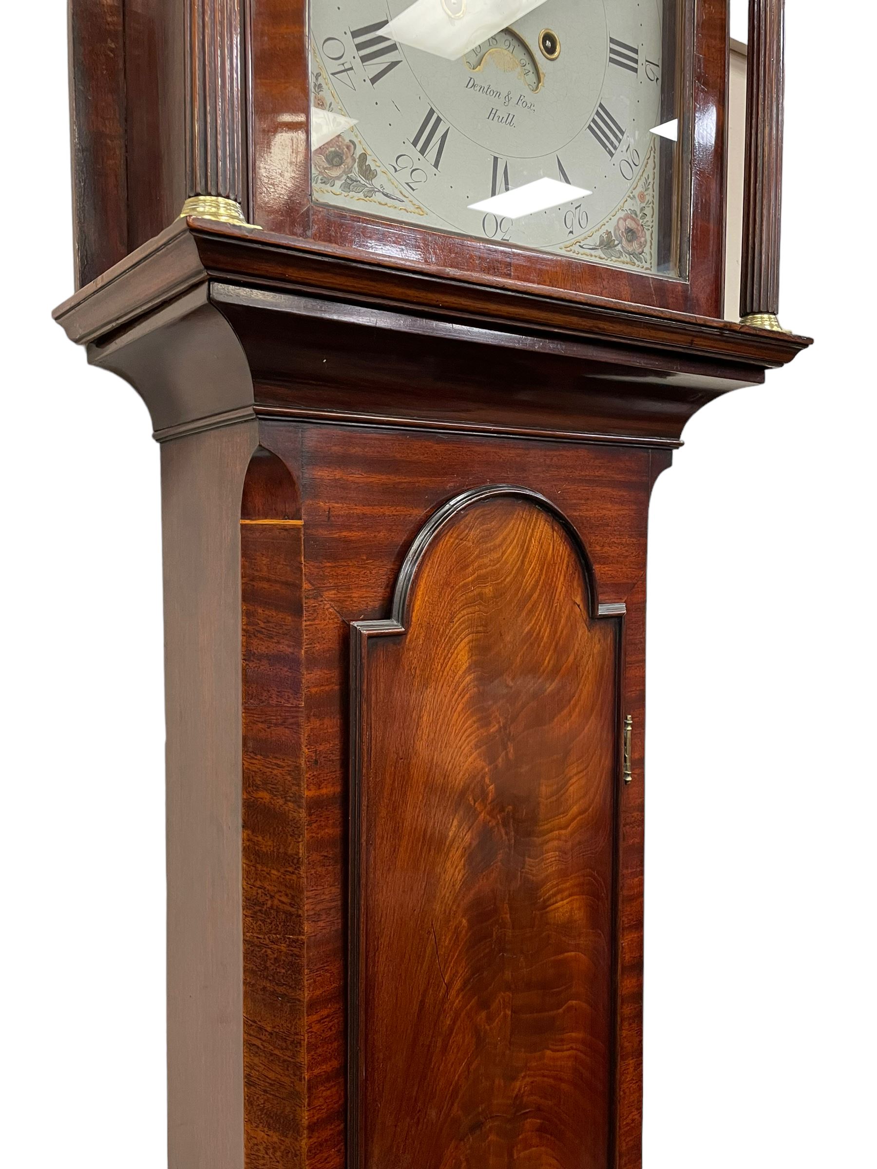 Denton & Fox of Hull – Early 19th century mahogany 8-day longcase clock c1802, pagoda pediment with an oval inlay and three ball and spire finials, break arch painted dial and hood door flanked by reeded pilasters with brass Corinthian capitals, long trunk door with conforming break arch top on a rectangular plinth raised on bracket feet, early Wilson (Birmingham) dial with Roman numerals, five minute Arabic’s and minute dots, subsidiary seconds dial and calendar aperture, with matching steel hands, floral spandrels within raised gesso work and a conforming oval depiction of a young maiden and dog to the break arch, dial pinned via a falseplate to a rack striking movement with a recoil anchor escapement striking the hours on a cast bell. With pendulum and weights.
Joseph Denton was a respected and prolific Hull clock maker working in Scale Lane Hull 1779 and Silver Street 1782-1814. Entering a short-lived partnership with Charles Fox from Beverley in 1802.
