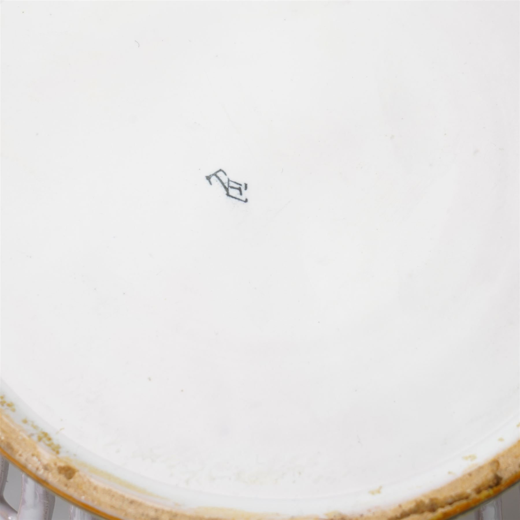 Two 20th century French faience openwork baskets, by Emile Tessier Malicorne, painted with polychromatic floral decoration, with scalloped rims, marked to base, larger 9cm (2)