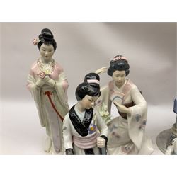 Two The Leonardo Collection figures of geisha women, together with five other oriental style figures