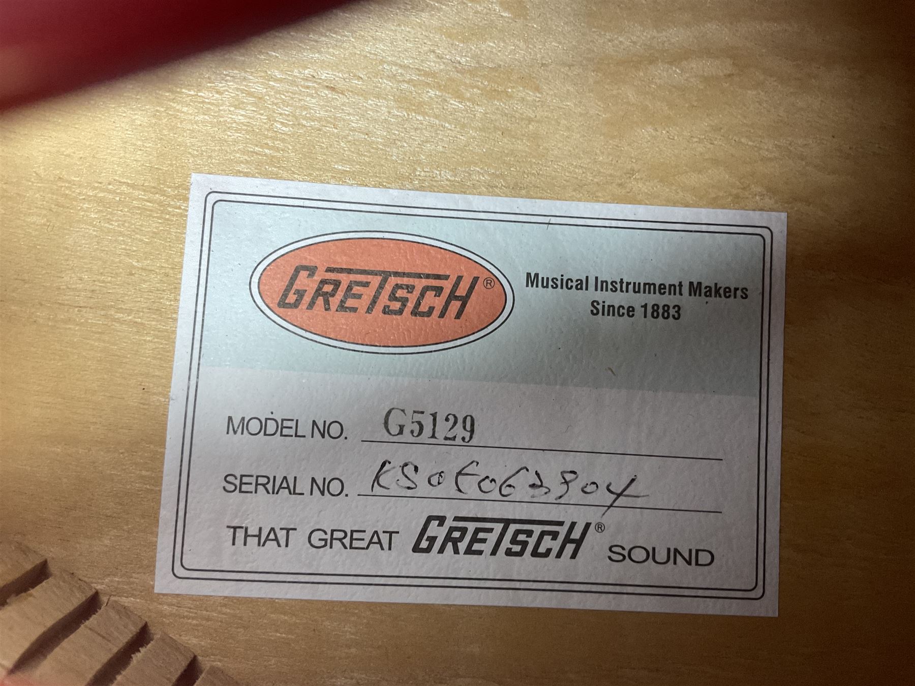 Gretsch Electromatic semi-acoustic guitar model G5129 in black and red with Bigsby tremolo, serial no.KS05063904; L105cm; in fitted hard carrying case