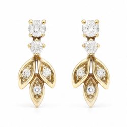 Pair of 18ct gold diamond leaf design earrings, each stud with diamond set leaves, suspend...